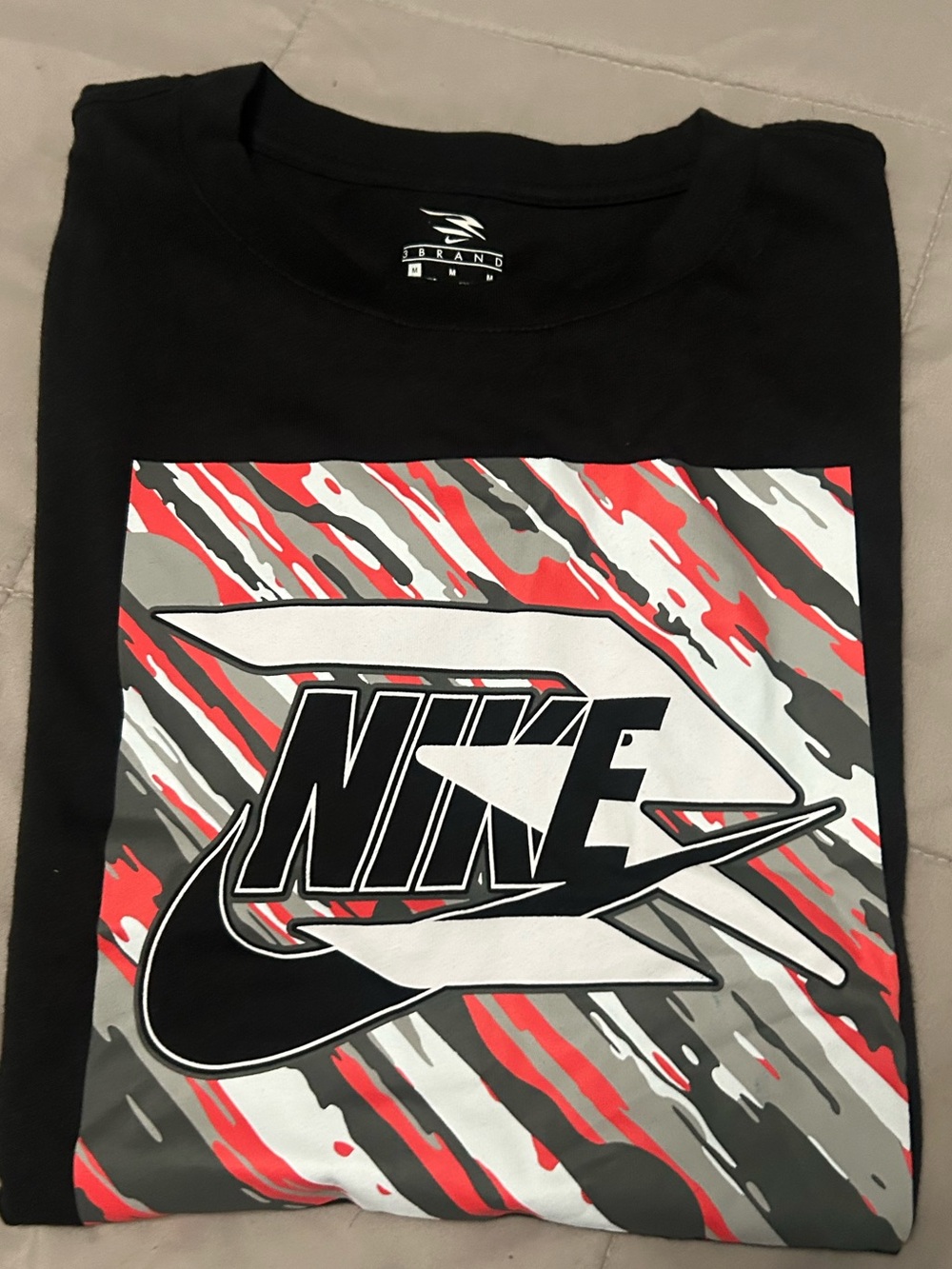 Brand new Nike Black Short-Sleeve Tee with Red and Gray Graphic